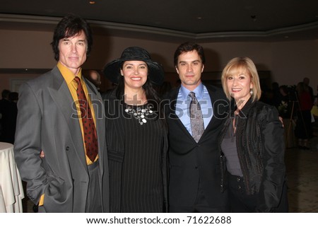 LOS ANGELES - FEB 20:  Ronn  Moss, Devin DeVasquez Moss, Rick Hearst & mom arrive at the 2011 Catholics in Media Associates Awards at Beverly HIlls Hotel on February 20, 2011 in Beverly Hills, CA