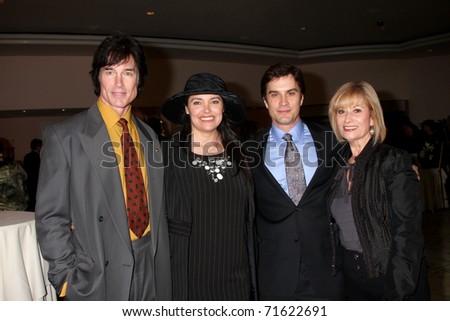 LOS ANGELES - FEB 20:  Ronn  Moss, Devin DeVasquez Moss, Rick Hearst & mom arrive at the 2011 Catholics in Media Associates Awards  at Beverly HIlls Hotel on February 20, 2011 in Beverly Hills, CA