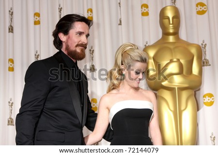 LOS ANGELES -  FEB 27:  Christian Bale, Reese Witherspoon arrive in the Press Room at the 83rd Academy Awards at Kodak Theater, Hollywood & Highland on February 27, 2011 in Los Angeles, CA