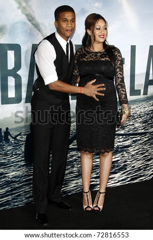 tia mowry and cory hardrict pregnant. stock photo : LOS ANGELES - MAR 8: Cory Hardrict and pregnant wife Tia Mowry