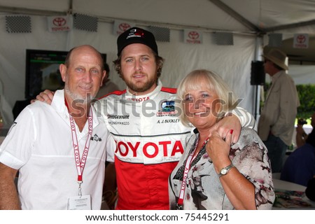 LOS ANGELES - APR 16:  Aj Buckley, Parents  at the Toyota Grand Prix Pro Celeb Race attend the Toyota Grand Prix Pro Celeb Race at the Toyota Grand Prix Track on April 16, 2011 in Long Beach, CA.