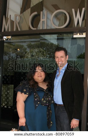 LOS ANGELES - JUL 12:  Executive Producer Yuan-Yuan Han and Tom Malloy arriving at a business luncheon at Mr. Chow on July 12, 2011 in Beverly Hills, CA