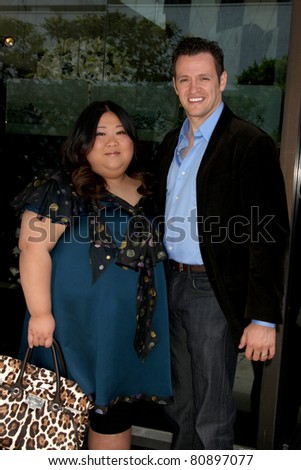 LOS ANGELES - JUL 12:  Executive Producer Yuan-Yuan Han and Tom Malloy arriving at a business luncheon at Mr. Chow on July 12, 2011 in Beverly Hills, CA