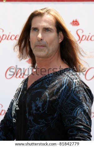 LOS ANGELES - JUL 28:  Fabio at a public appearance to promote the Epic Old Spice Challenge  at The Grove on July 28, 2011 in Los Angeles, CA