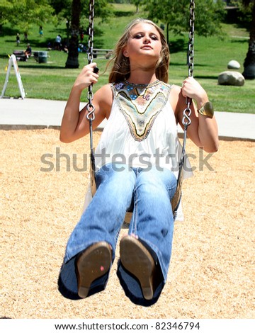 LOS ANGELES - AUG 1:  Savannah Outen plays in the park, wearing Wallflower jeans  at Midtown LA on August 1, 2011 in Los Angeles, CA