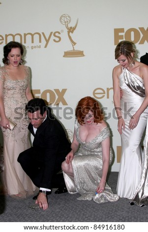LOS ANGELES - SEP 18:  Elisabeth Moss, Jon Hamm, Christina Hendricks in the Press Room at the 63rd Primetime Emmy Awards at Nokia Theater on September 18, 2011 in Los Angeles, CA
