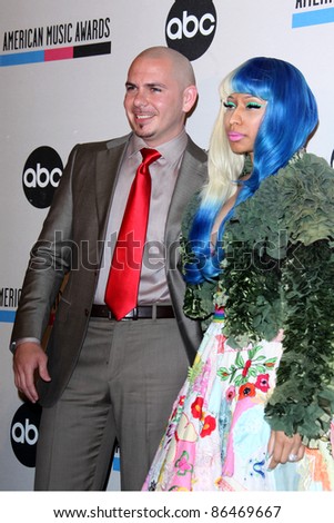 LOS ANGELES - OCT 11:  Pitbull; Nicki Minaj arriving at the 2011 American Music Awards Nominations Press Conference  at the JW Marriott Los Angeles at L.A. LIVE on October 11, 2011 in Los Angeles, CA