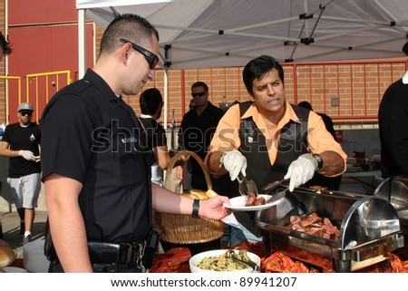 LOS ANGELES - NOV 30:  Eric Estrada at the Hollywood Chamber Of Commerce 17th Annual Police And Fire BBQ at Wilcox Station on November 30, 2011 in Los Angeles, CA