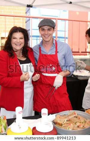 LOS ANGELES - NOV 30:  Ann Lopez, Kenny Doughty at the Hollywood Chamber Of Commerce 17th Annual Police And Fire BBQ at Wilcox Station on November 30, 2011 in Los Angeles, CA