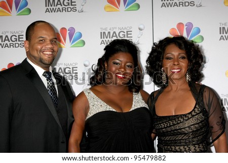 LOS ANGELES - FEB 17:  Stephen L. Hightower II, Julia Pace Mitchell, Judy Pace arrives at the 43rd NAACP Image Awards at the Shrine Auditorium on February 17, 2012 in Los Angeles, CA