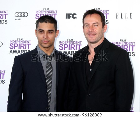 LOS ANGELES - FEB 25:  Wilmer Valderrama, Jason Issacs arrives at the 2012 Film Independent Spirit Awards at the Beach on February 25, 2012 in Santa Monica, CA