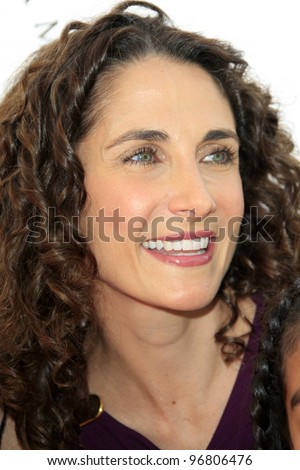 LOS ANGELES - MAR 4:  Melina Kanakaredes arrives at the  Have A Dream Foundation\'s 14th Annual Dreamers Brunch at the Skirball Cultural Center on March 4, 2012 in Los Angeles, CA