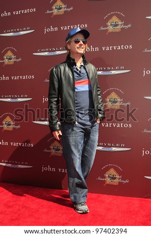 LOS ANGELES - MAR 11:  David Spade arrives at the 9th Annual John Varvatos Stuart House Benefit at the John Varvatos Store on March 11, 2012 in West Hollywood, CA