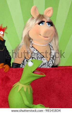 LOS ANGELES - MAR 20:  Miss Piggy, Kermit at the Hollywood Walk of Fame Star Ceremony for The Muppets at the El Capitan Theater on March 20, 2012 in Los Angeles, CA
