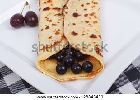 Sweet healthy pancake with berries. Dessert closeup