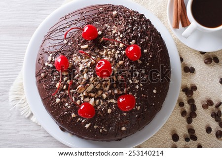chocolate cake and coffee on the table. horizontal view from above closeup