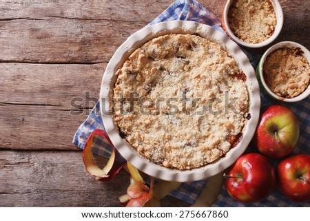 Traditional apple crisp close-up in baking dish. view from above horizontal, rustic style