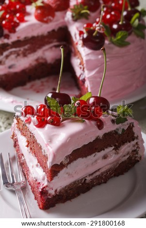 Slice of delicious homemade berry cake on a plate closeup. vertical