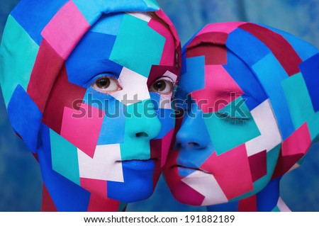 cubism styled ladies wiyh angular face-art isolated on blue background