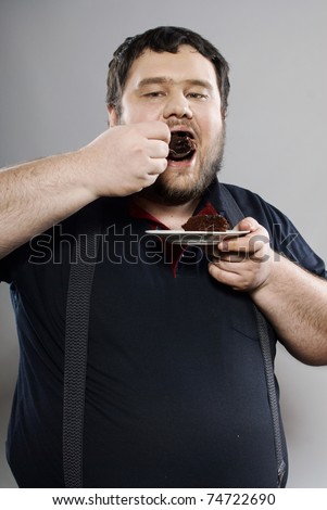 funny fat people quotes. fat guy eating cake. stock