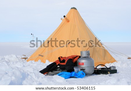 Yellow tent and camping equipment