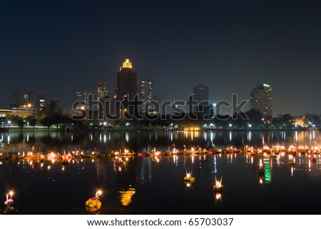 BANGKOK - NOVEMBER 21: Loy Kratong Festival celebrated during the full moon of the 12th month in the traditional Thai calendar, to pay respect to water spirits on 21 November 2010 in Bangkok