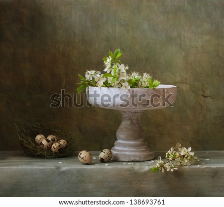 Vintage still life with cherry blossom and  quail eggs