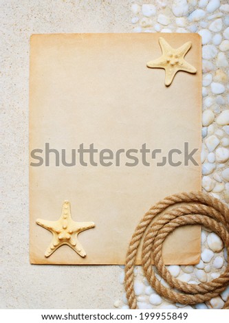Blank sheet of paper on the sea sand for beach party