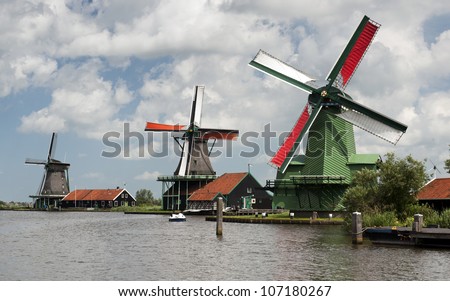Windmills: typical  dutch landscape with colorful mills in Zaandam, Zaanse Schans
