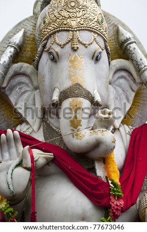 Statue of an indian (hindu, buddhist) divinity: Ganesh or Ganesha  in a hindu temple (Grand Basin) in Mauritius