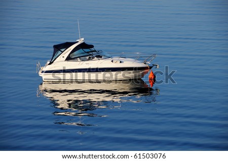 Anchored motor boat