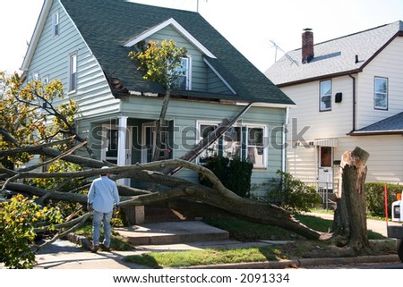 Damaged House from Tree Collapse Due to Storm