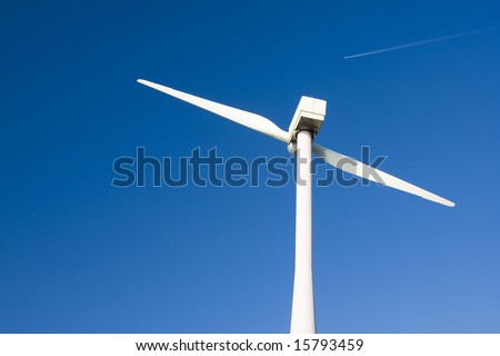 Two Bladed Windmill Against a Blue Sky