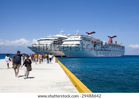 COZUMEL, MEXICO - MARCH 23 : Carnival Cruise Line ships dock at the harbor March 23, 2009 in Cozumel, Mexico.