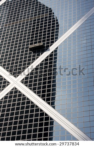 Window Washer on Side of Glass Building