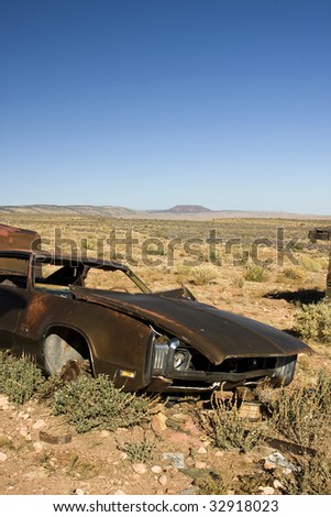 Old Abandoned Junk Car in Desert