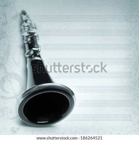 musical retro background with flute, key and notes