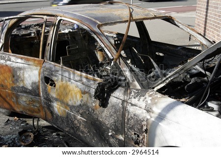 Wrecked Abandoned Burnt Out Car With Melted Interior - Fire Damage
