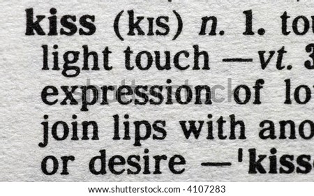 Kiss. Close-up of the word 'Kiss' in a dictionary. Structured Lighting Of The Page, Paper