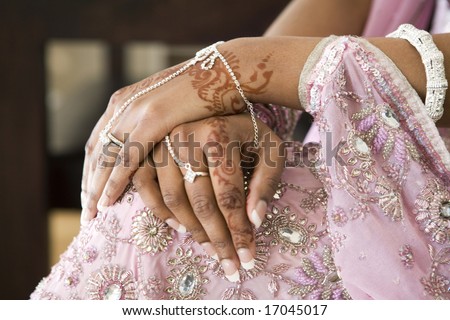 stock photo Bride's Hand With Henna Tattoo And Jewellery Indian Wedding