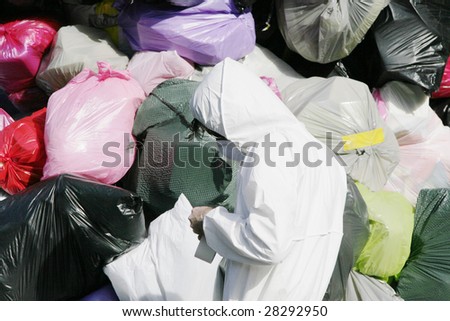 Many Garbage Plastic Bags, Man In White Protective Suit