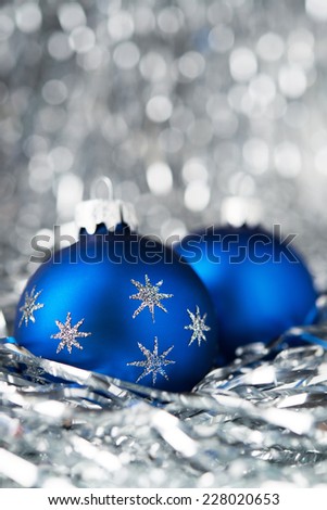 Blue christmas balls on holiday background. Merry christmas card. Winter holidays. Xmas theme.