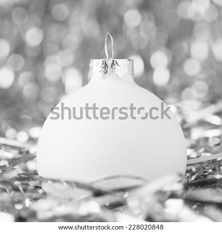 White christmas ball on holiday background. Merry christmas card. Winter holidays. Xmas theme.