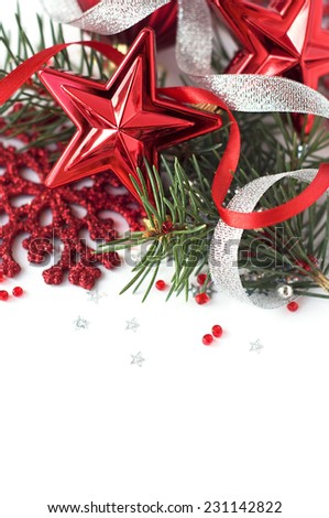 Red christmas ornaments on white background with space for text. Merry christmas card. Winter holidays. Xmas theme.
