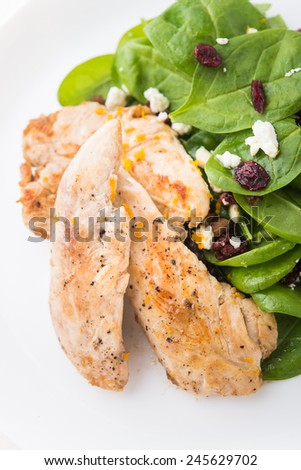 Chicken with spinach salad. Healthy food.