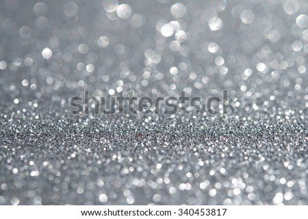 Abstract silver glitter holiday background. Winter xmas holidays. Christmas.