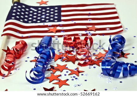 flag and red,white and blue confetti and ribbon curls
