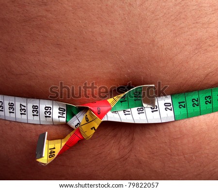 fat belly with tape measure