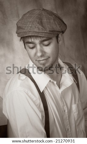 black newsboy cap. Young Man in Newsboy Cap