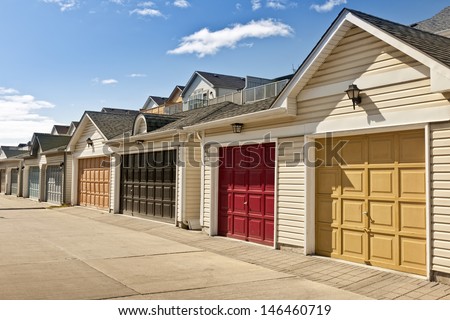 Row Of Garage Doors At Parking Area For Townhouses